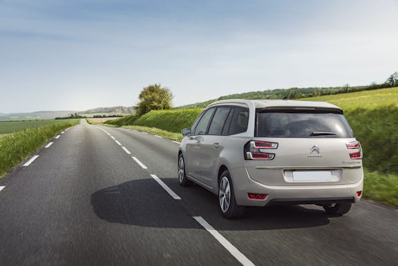 The rear exterior of a white Citroen Grand C4 Spacetourer