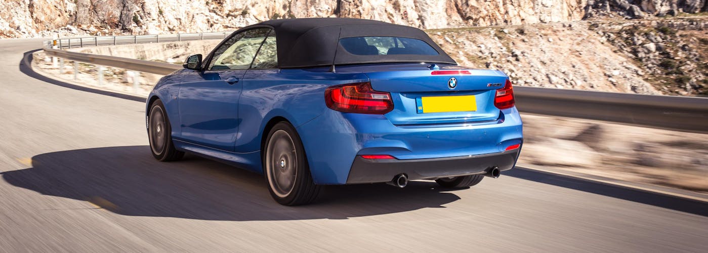 The exterior of a blue BMW 2 Series