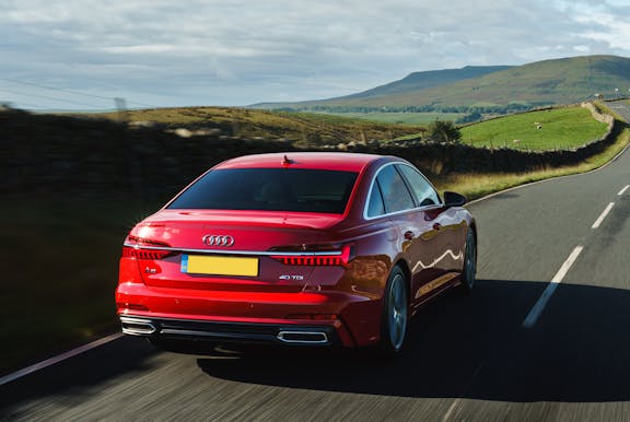 The rear exterior of a red Audi A6