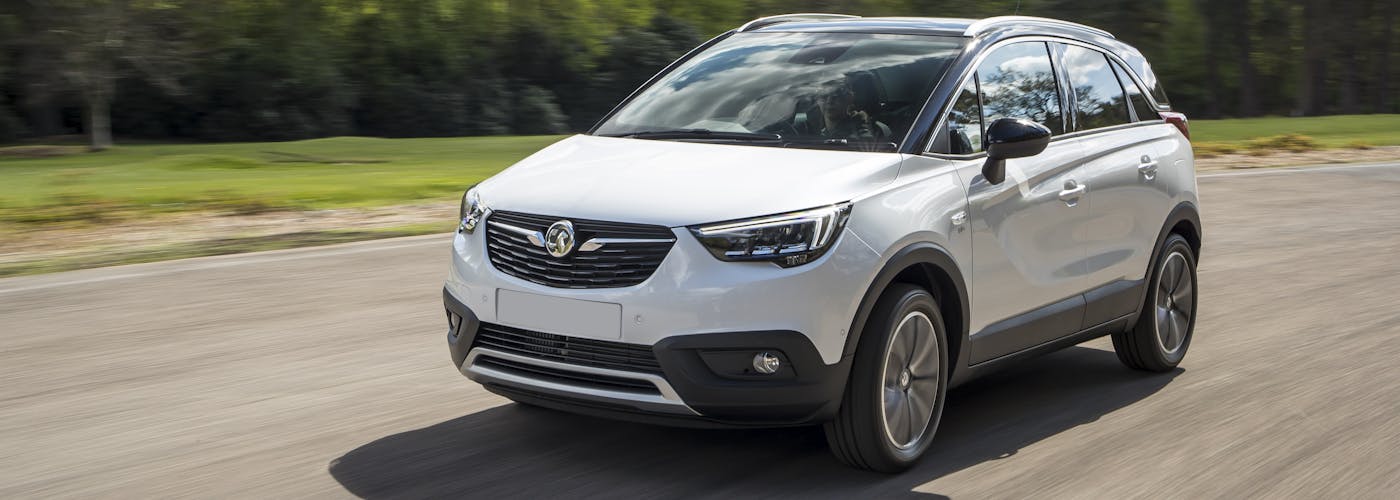 The front exterior of a white Vauxhall Crossland X