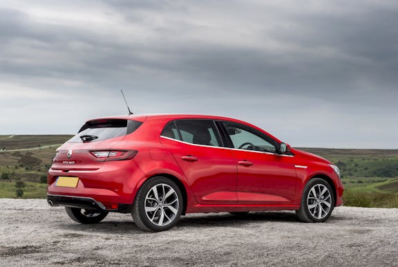 The rear exterior of a red Renault Megane