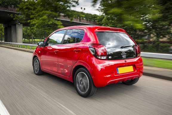 The exterior of a red Peugeot 108