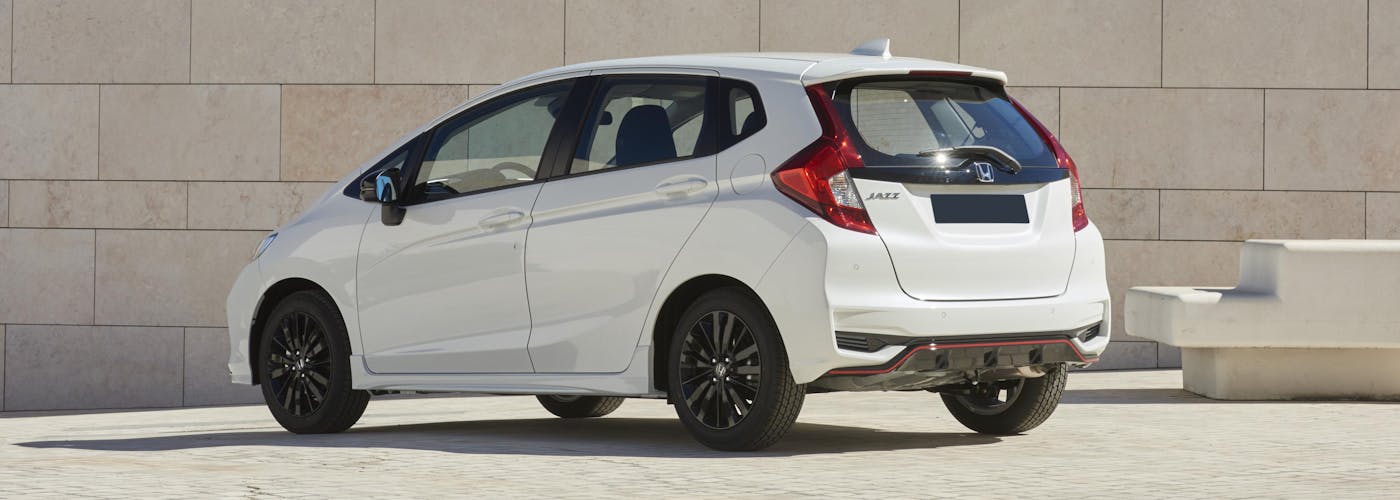 The exterior of a white Honda Jazz
