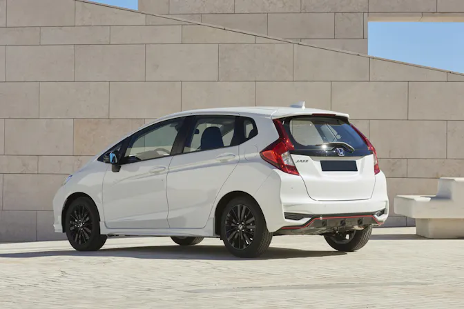 The exterior of a white Honda Jazz