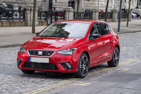 The exterior of a red Seat Ibiza