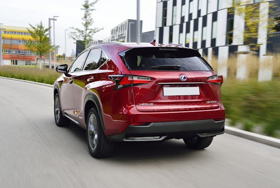 The rear exterior of a red Lexus NX