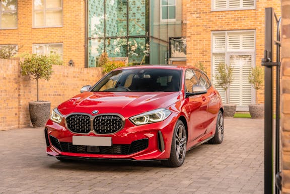 The exterior of a red BMW 1 series