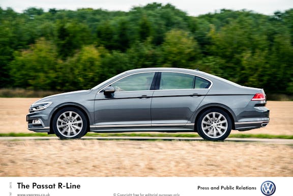 The side exterior of a silver Volkswagen Passat