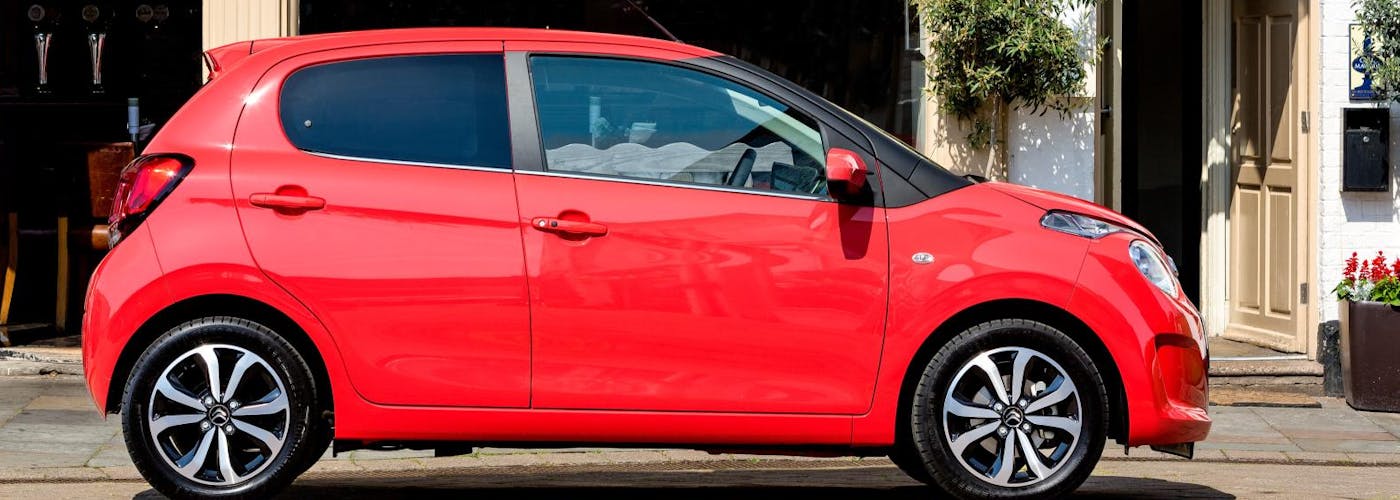 The side exterior of a red Citroen C1