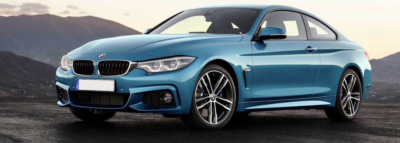 The exterior of a blue BMW 4 Series