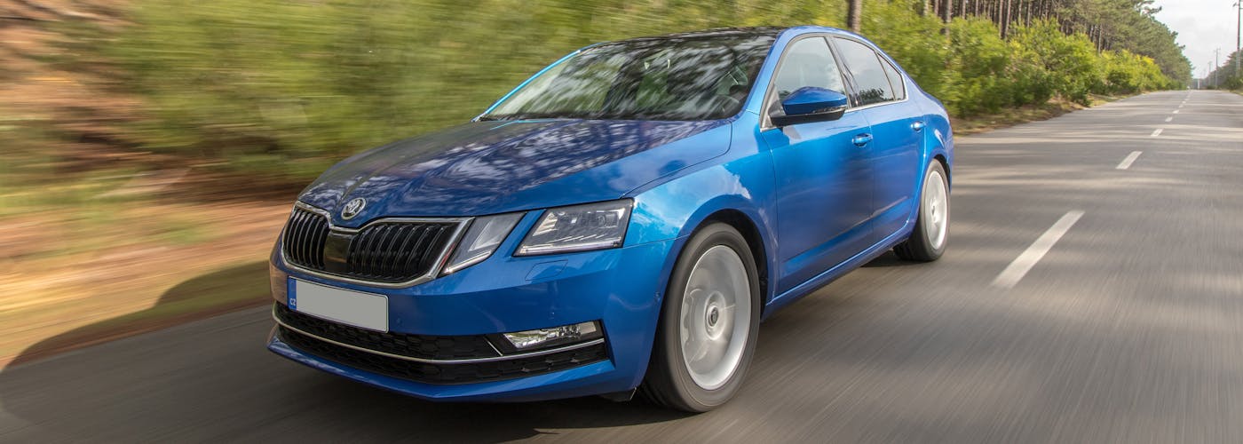 The front exterior of a blue Skoda Octavia