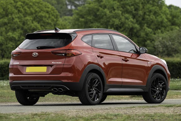 The exterior of a red Hyundai Tucson