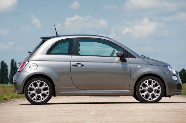 The side exterior of a silver Fiat 500