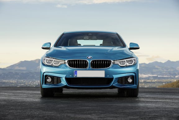 The exterior of a blue BMW 4 Series