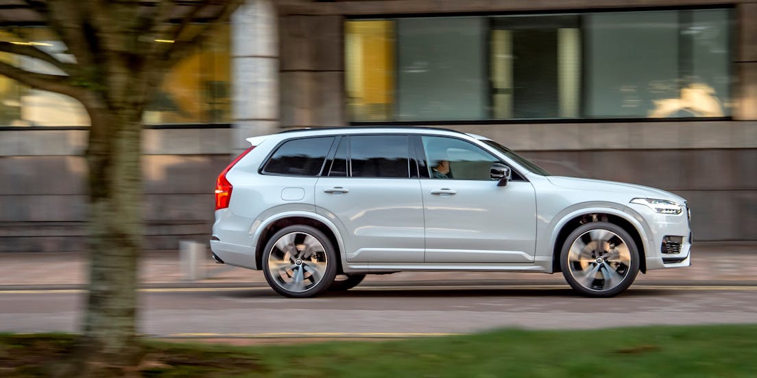 The side exterior of a white Volvo XC90