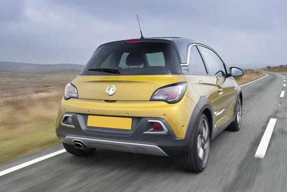 The exterior of a yellow Vauxhall Adam