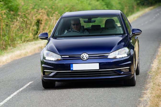 The exterior of a blue Volkswagen Golf