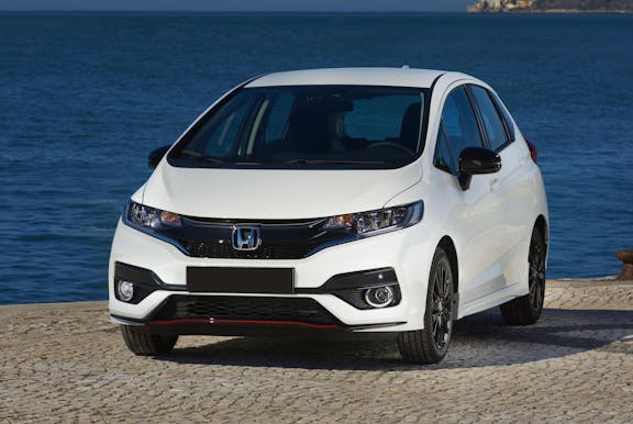 The exterior of a white Honda Jazz