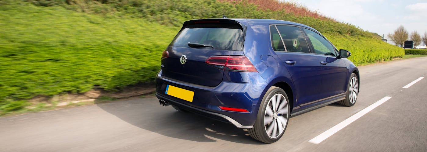 The rear exterior of a blue Volkswagen Golf
