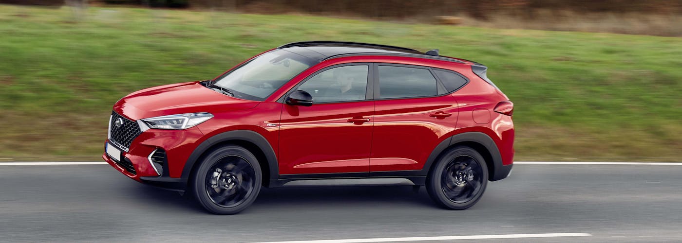 The exterior of a red Hyundai Tucson