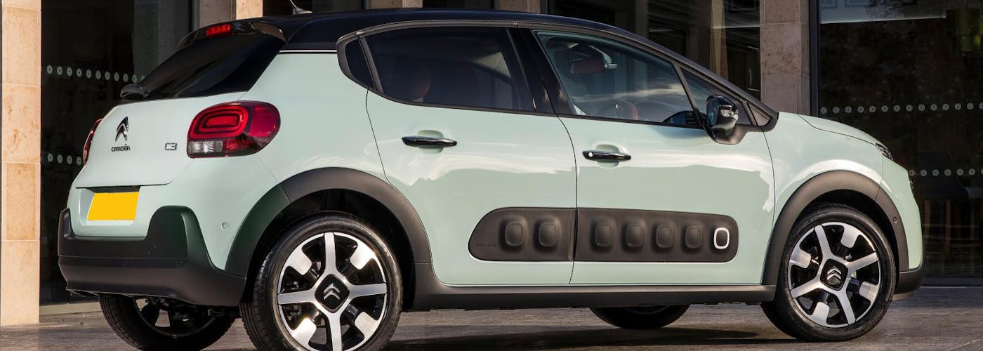The side exterior of a blue Citroen C3