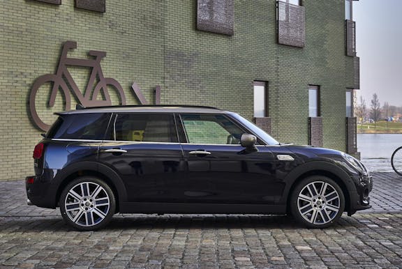 The side exterior of a black Mini Clubman