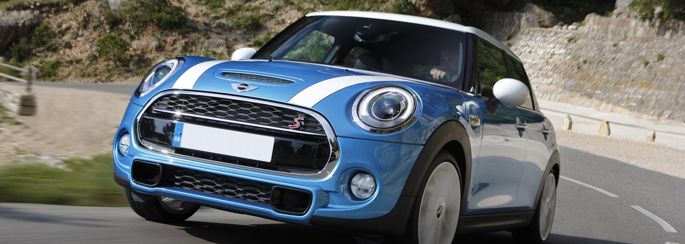 The exterior of a blue Mini Hatchback