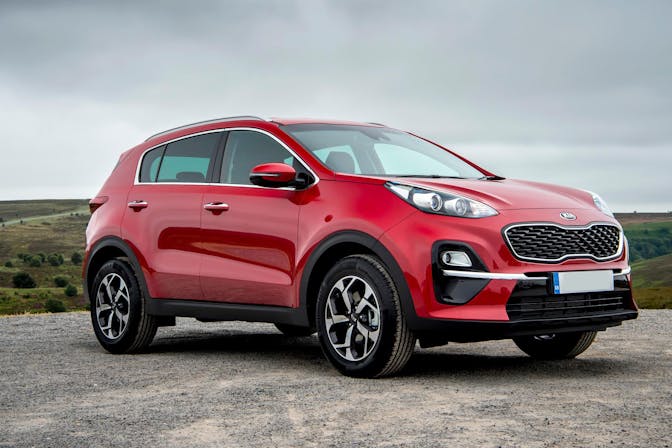 The exterior of a red Kia Sportage