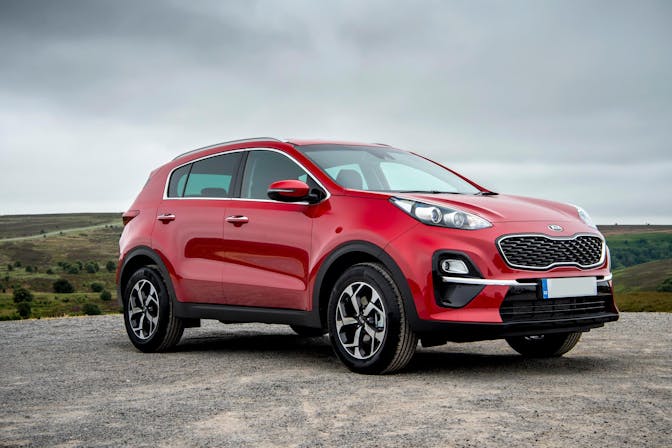 The exterior of a red Kia Sportage