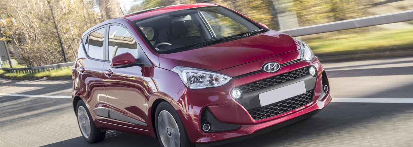 The exterior of a red Hyundai i10