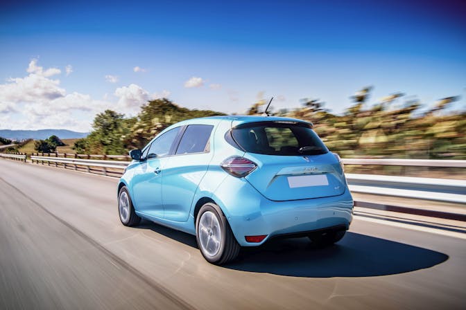 The rear exterior of a blue Renault Zoe