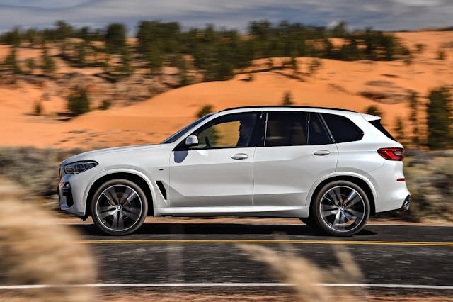The side exterior of a white BMW X5
