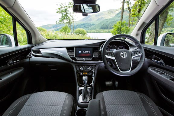 The interior of a Vauxhall Mokka X with steering wheel and dashboard in shot