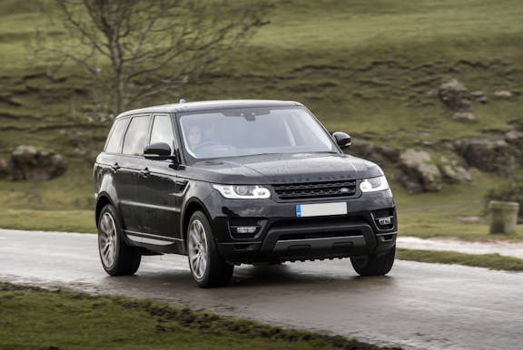 The front exterior of a black Land Rover Range Rover Sport