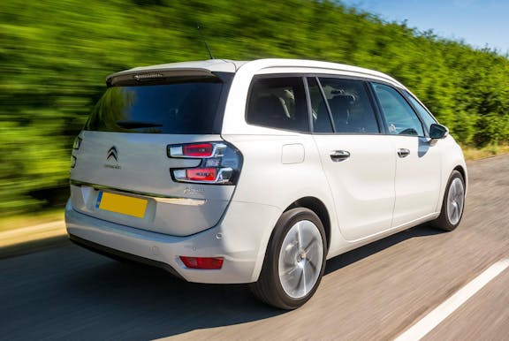 The rear exterior of a white Citroen Grand C4 Picasso