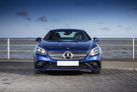 The front exterior of a blue Mercedes-Benz SLC