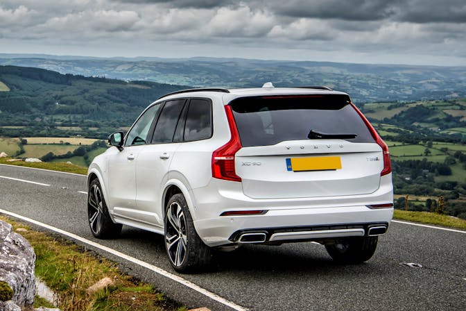 The rear exterior of a white Volvo XC90