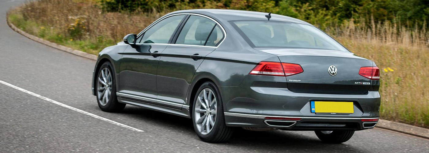 The rear exterior of a silver Volkswagen Passat