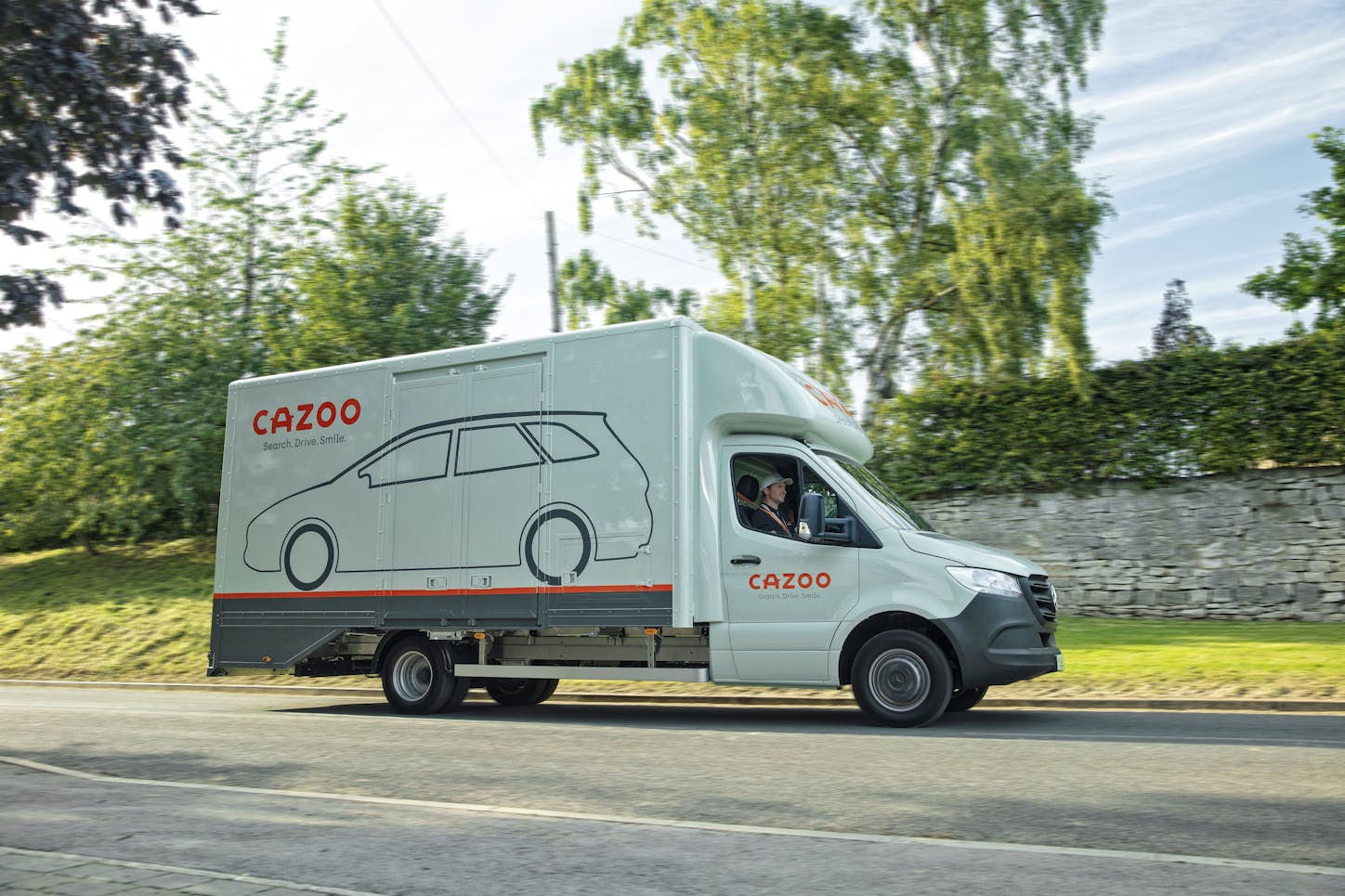 Moving Cazoo car transporter 