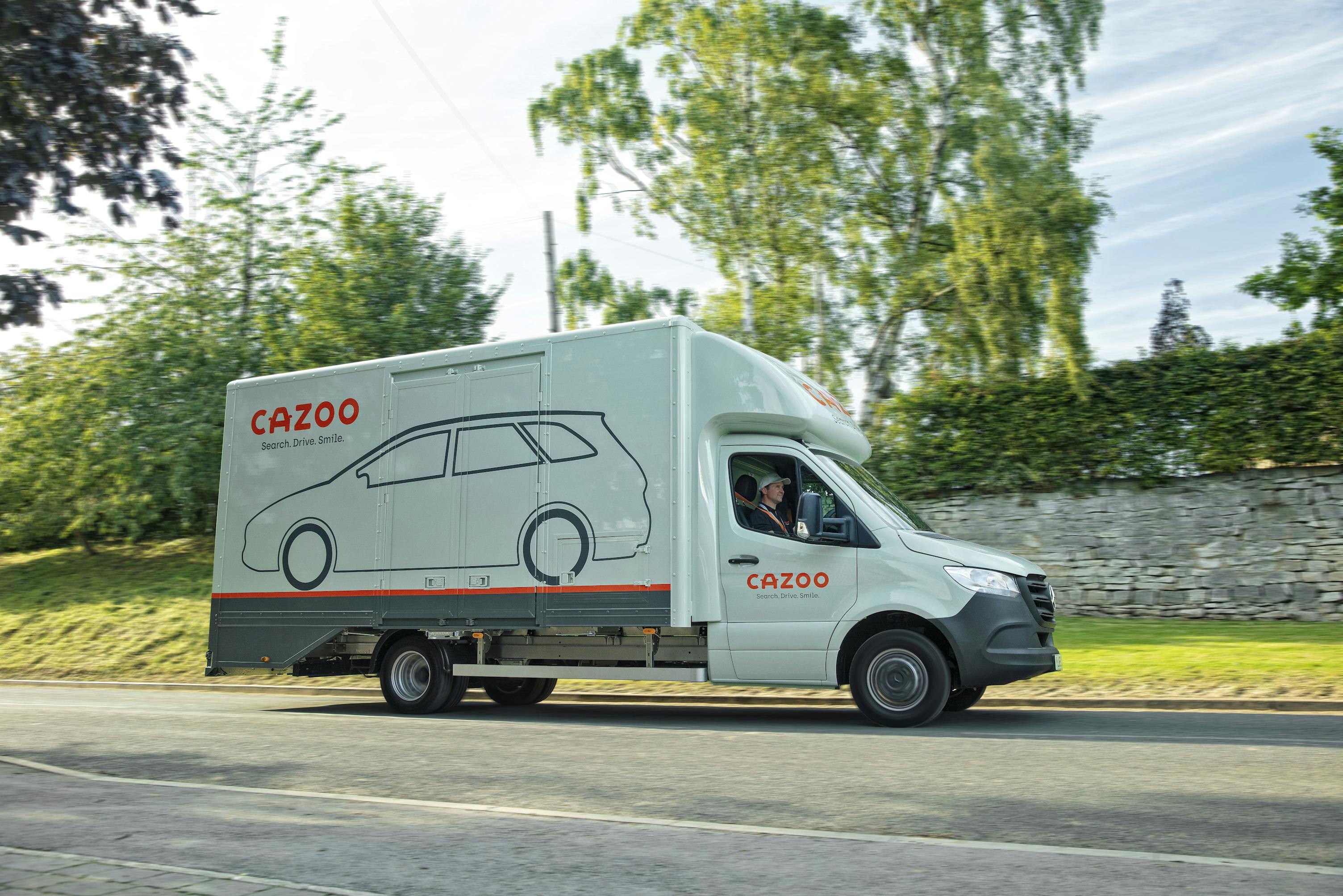 Moving Cazoo car transporter