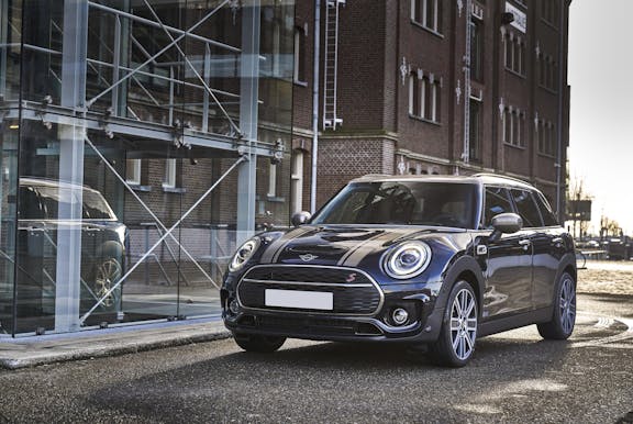 The front exterior of a black Mini Clubman