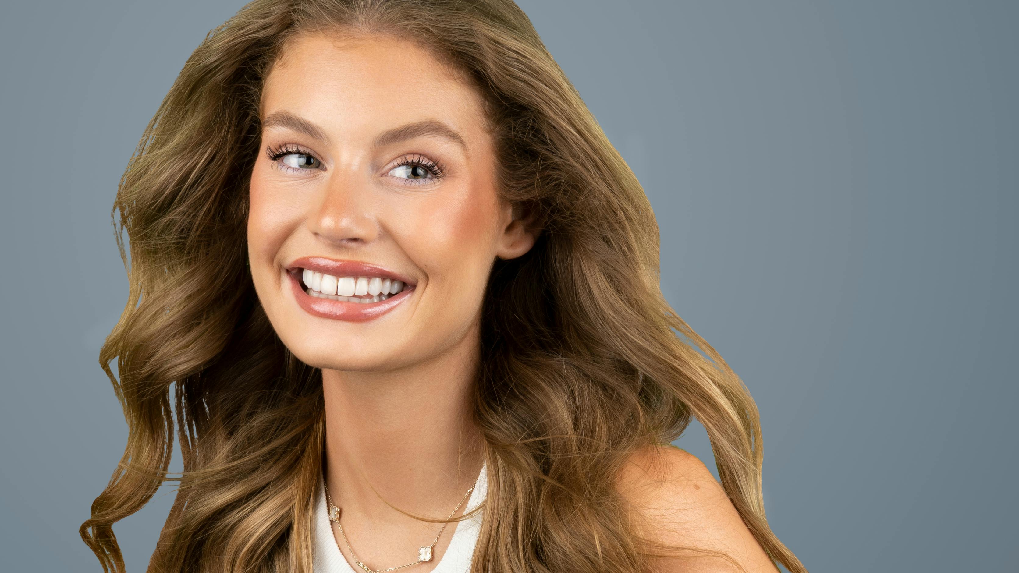 Beauty queen model smiling with gappy smile after veneers