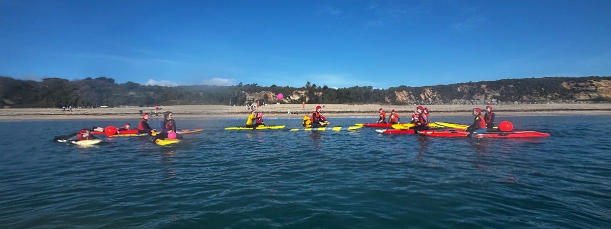 Kids on boards playing dodgeball