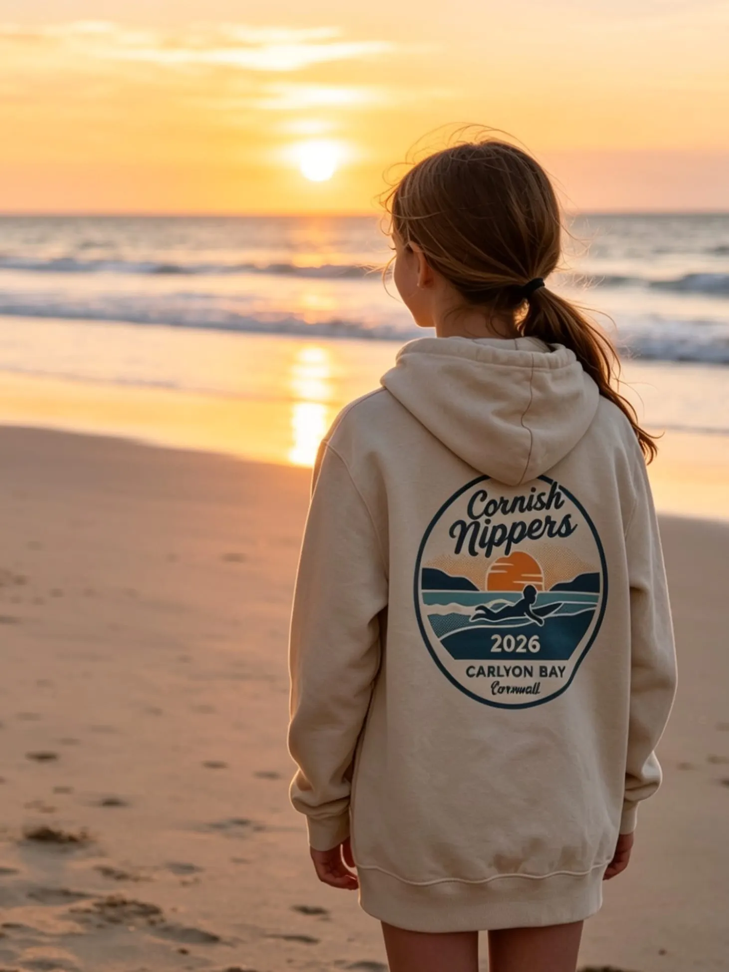 Image of girl looking out to beach wearing Cornish Nipper Hoodie