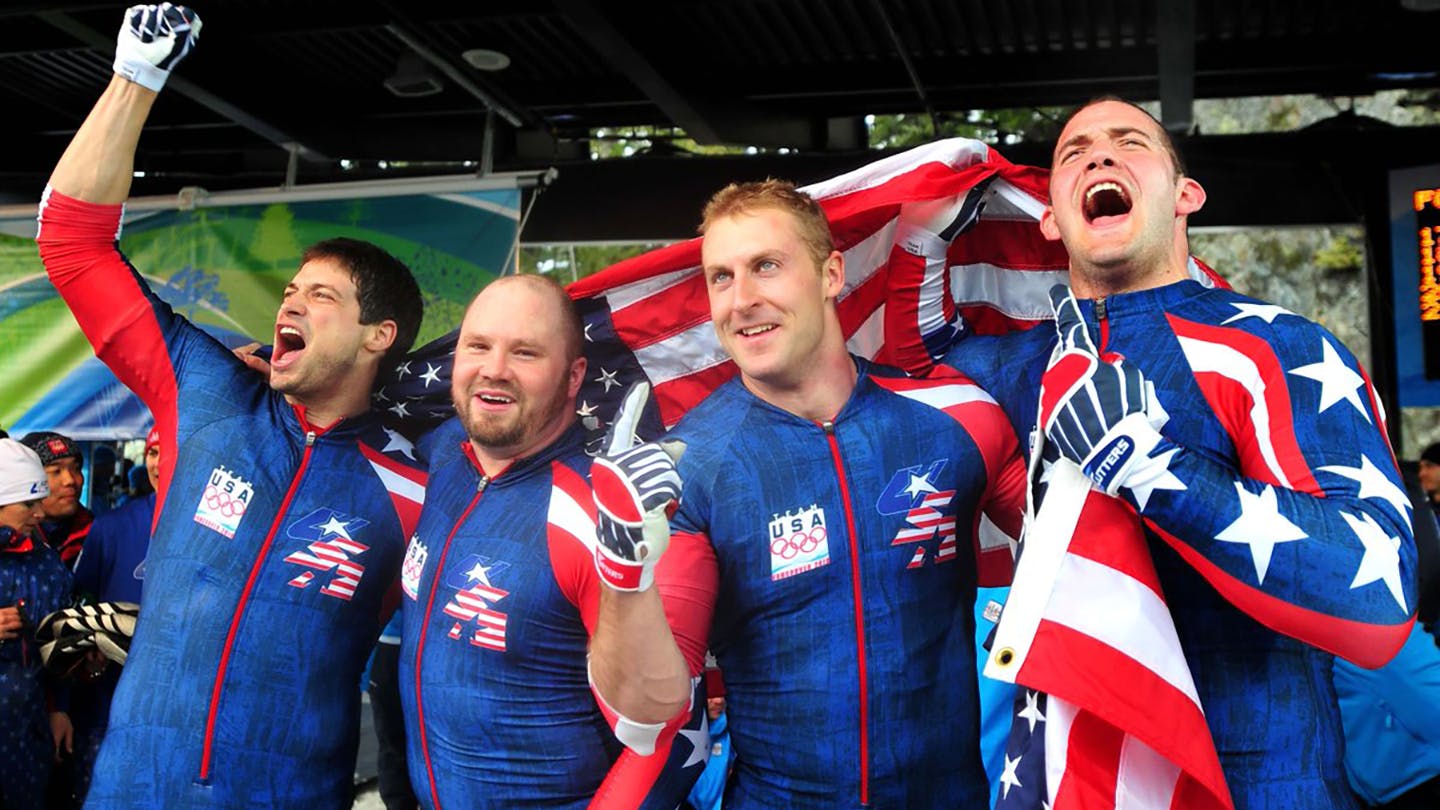 Steve Mesler wins an Olympic gold medal in bobsled in the 2010 Vancouver Olympics with his Team USA teammates