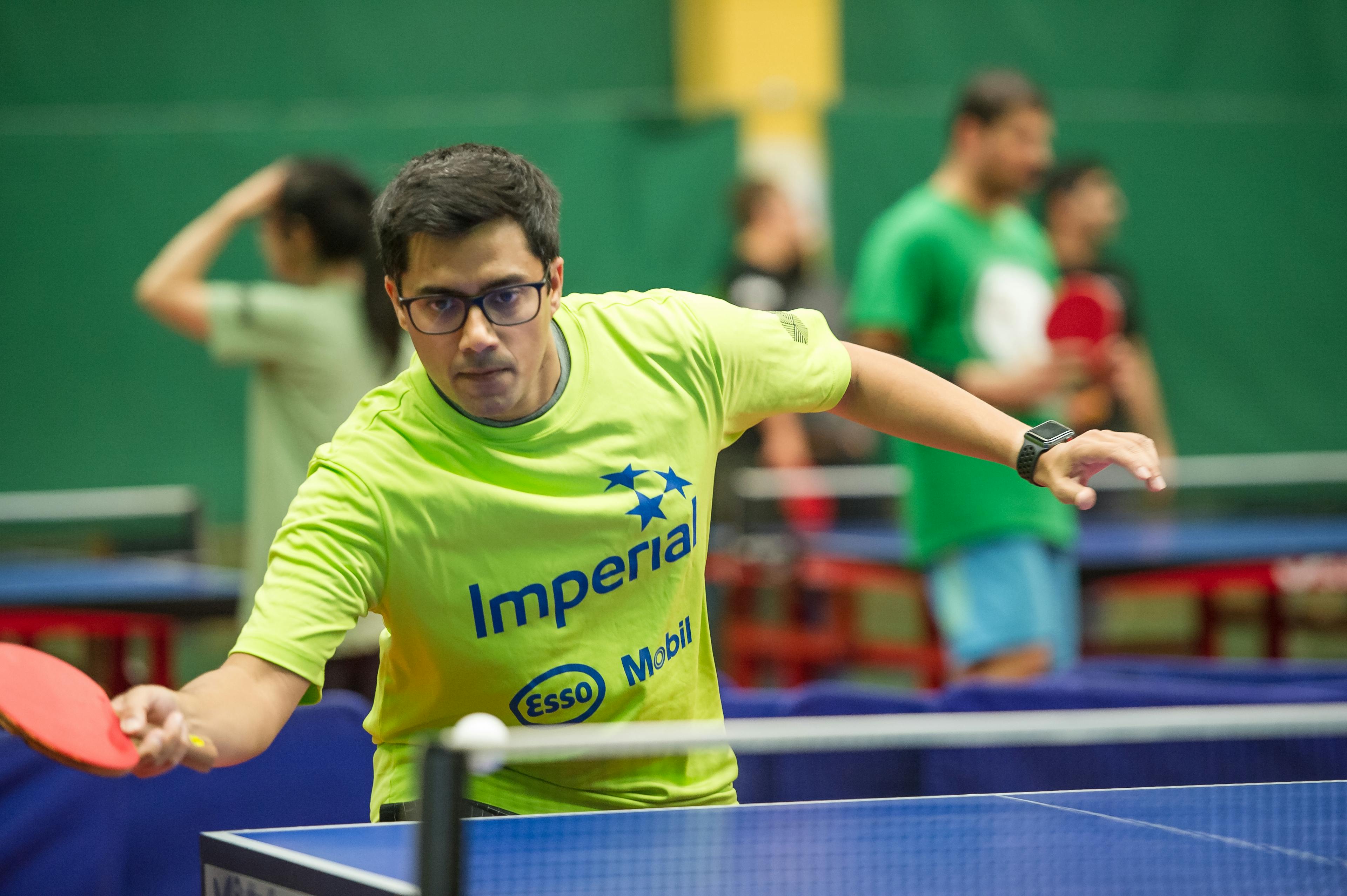 man playing table tennis