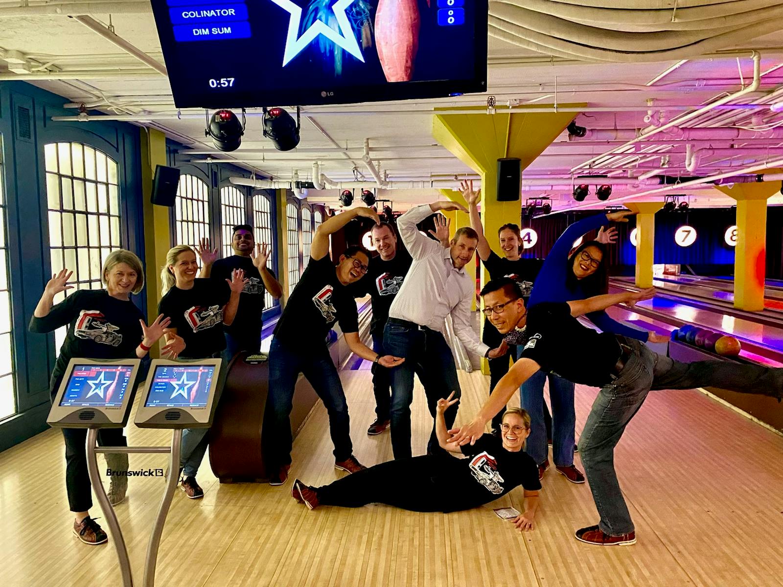 Team posing at bowling