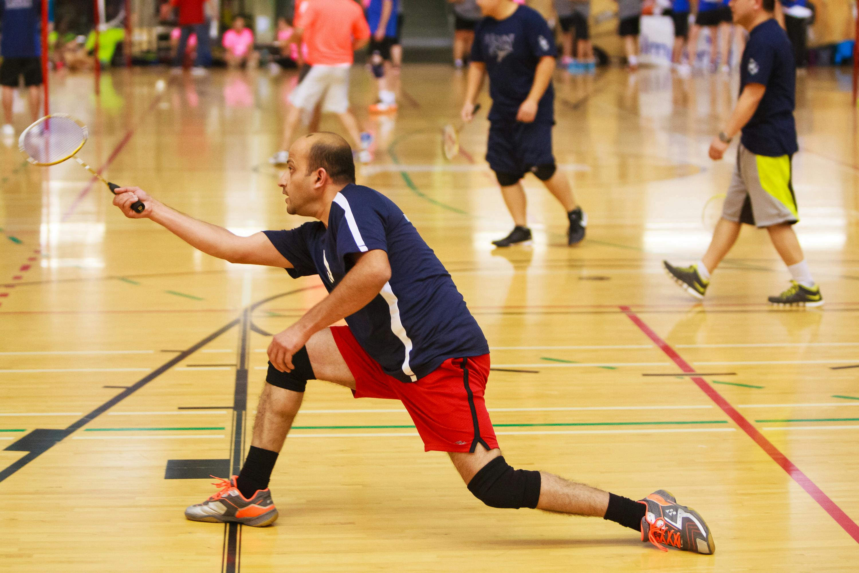 teams playing badminton