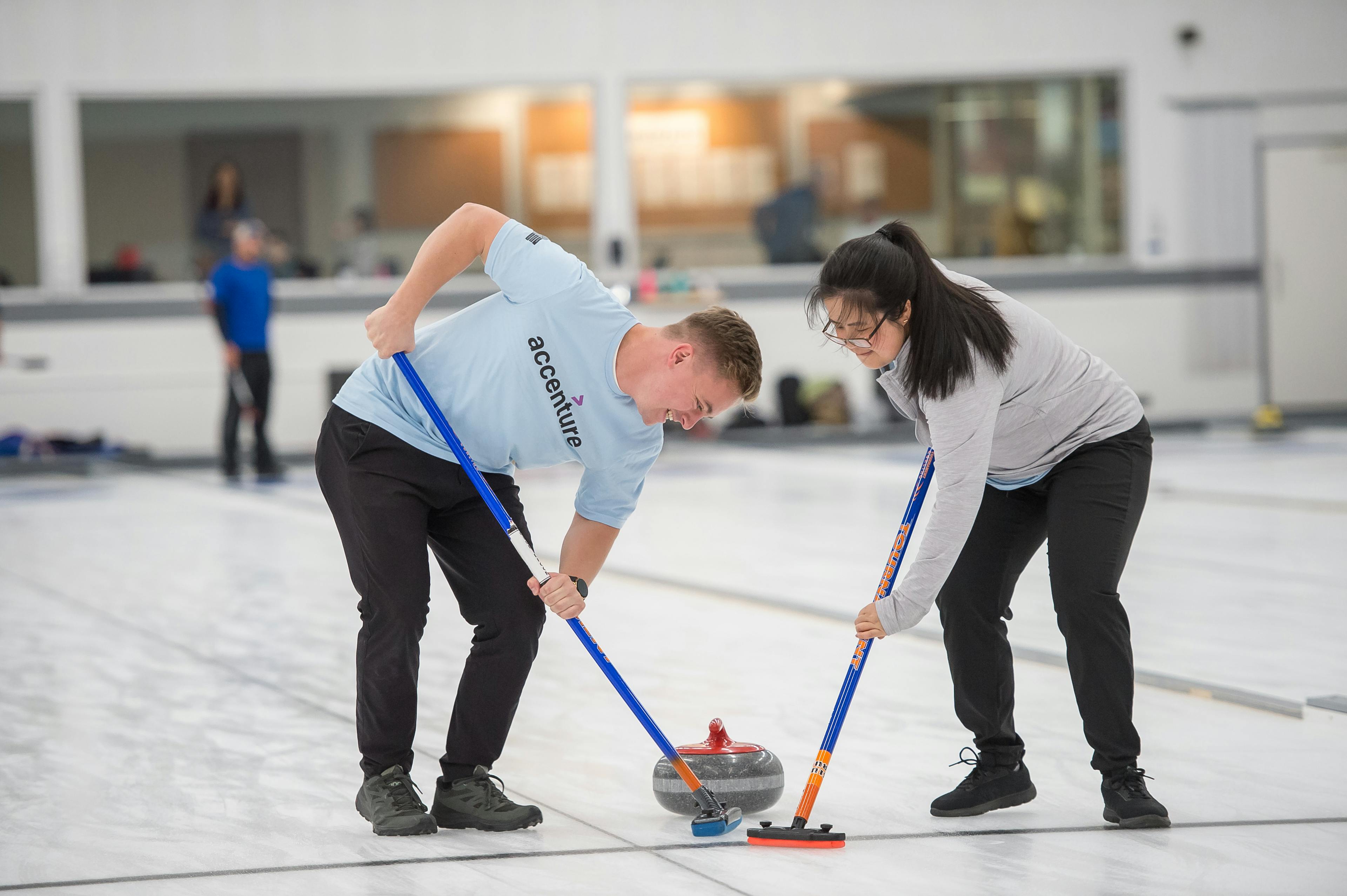 two participants curling