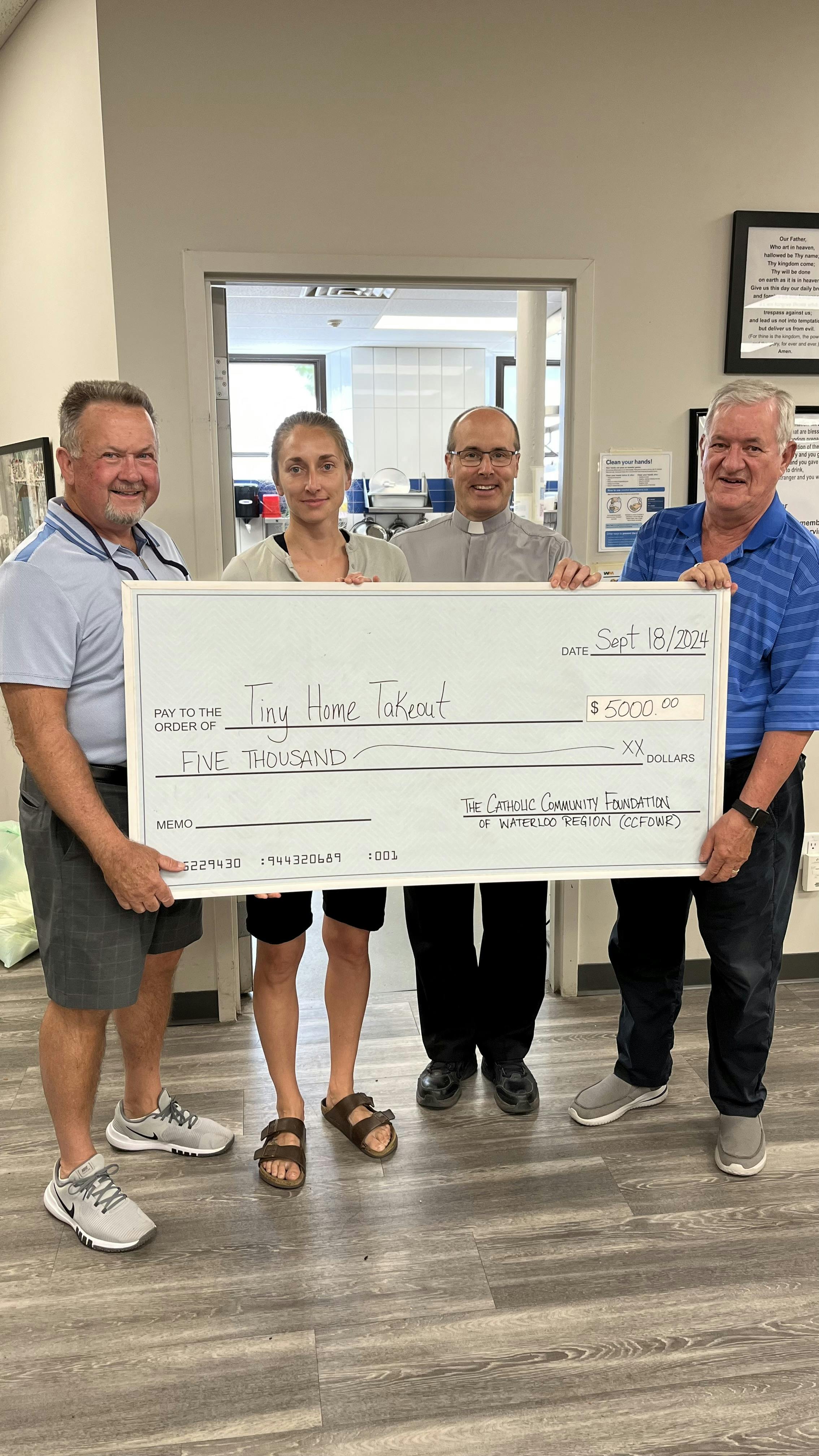 Donation presented to Tiny Home Takeout at St. Mary's Parish